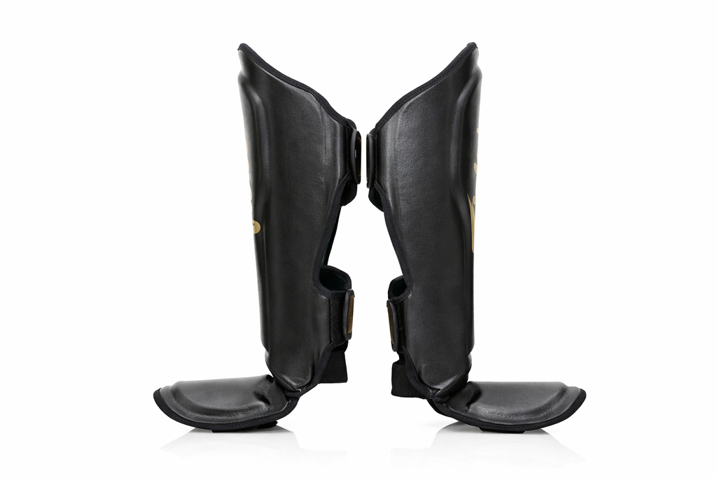 Booster Fairtex chrániče holení - černá/zlatá, FXB-SG-B-G