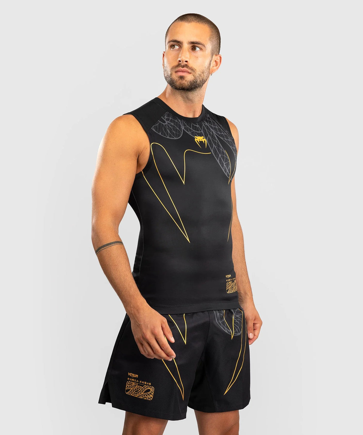 Venum Serpenti Pánský rashguard bez rukávů - tílko, černá/zlatá, VENUM-05748-109
