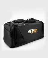 Venum Trainer Lite Evo sportovní taška - černá/zlatá