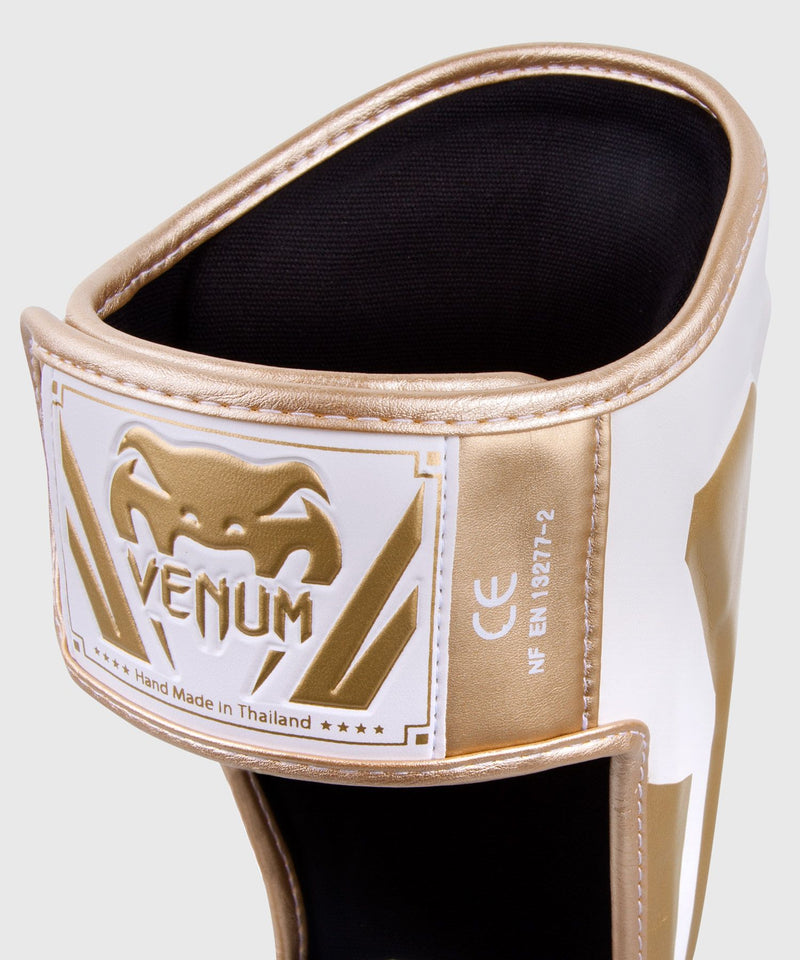 Chrániče holení Venum Elite - bílá/zlatá
